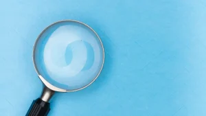 magnifying glass on blue background